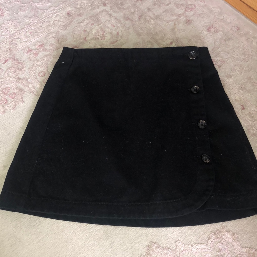 Black skirt. Buttoned up side